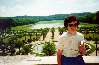 My mom by the orange grove at Versailles